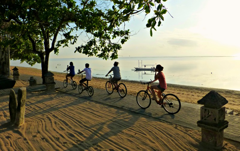 Cycling along the beach in Sanur, Bali